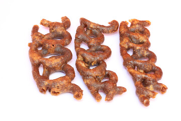 3 pieces of palm jaggery candy isolated in the white background, a south indian sweet 