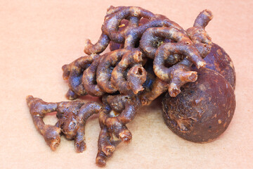 Palm jaggery candy prepared using palm candy in south Tamil nadu placed in the brown background