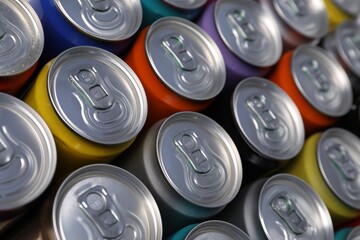 Many aluminium cans of beverage as background, closeup