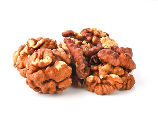 bunch of peeled walnuts isolated on a white background.