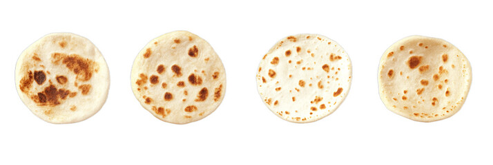 Multiple tortillas are arranged in a row, displaying various levels of toasting and cooking. Each tortilla has unique markings, highlighting textures and colors from the cooking process
