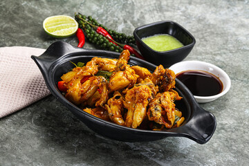 Vietnamese cuisine - fried frog with vegetables