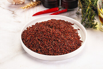 Red raw dry rice gor cooking