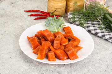 Red pickled herring fish fillet