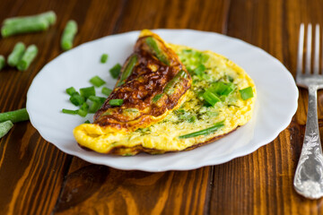 Omelette with beans and fresh herbs