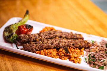 Turkish adana kebab with vegetables