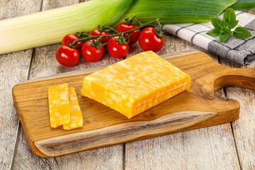 Marble yellow cheese with slices