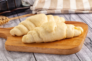 Raw uncooked croissant for bake