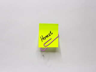 Sticky note with positive words written on a white background. Motivational word photo concept....