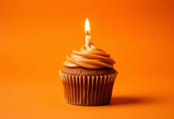 A single, delicious cupcake with a lit candle, set against a vibrant orange background, food, delicious
