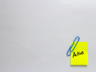 Sticky note with positive words written on a white background. Motivational word photo concept....