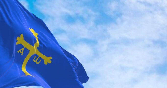 Asturias flag waving in the wind on a clear day