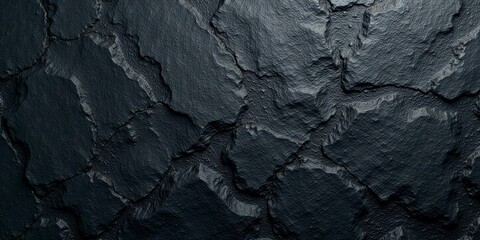 Dark Gray Stone Texture A Close-Up View of Rough, Cracked, and Irregular Surface