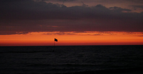 Fototapeta premium A flag stripe on the horizon