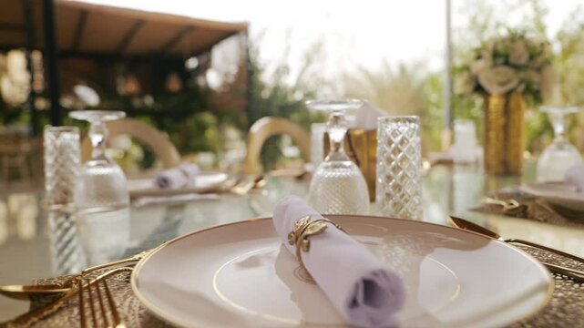 Video Elegant gold cutlery on a luxurious dining table. KSA
