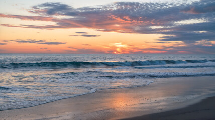 Fototapeta premium Coastal Sunset with Gentle Waves