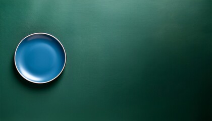 empty blue plate on blue background
