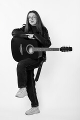 young woman with acoustic guitar