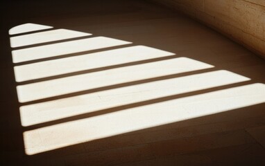 Bright Sunlight Beams Through Arched Window Casting Shadows on Textured Floor