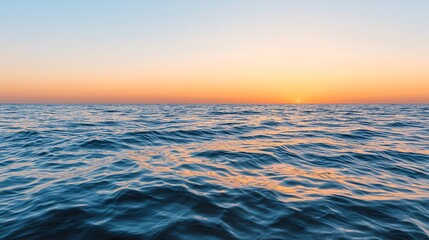 Fototapeta premium Peaceful Ocean Sunset Warm Hues and Calm Waves