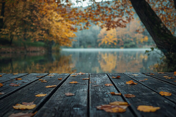 Autumnal lake scene with wooden dock and golden leaves reflecting peaceful misty morning calm fall
