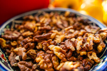 Peeled and toasted walnuts close-up in a plate