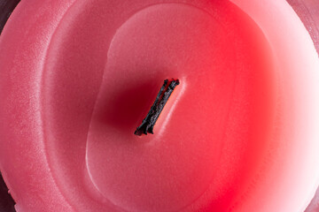 Wooden wick after candle use close-up, top view