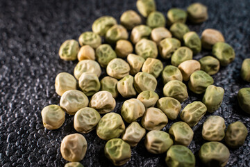 Pea seeds close-up on gray background