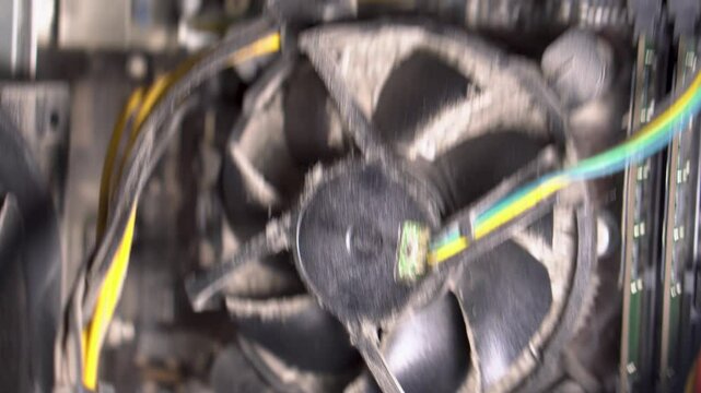 Close-up of a PC cooling system, a dirty radiator from a computer