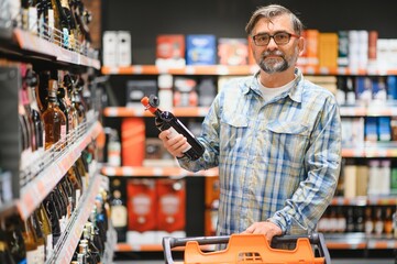 Senior man at grocery store products