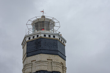 A coastal lighthouse, which is used to mark the shores and determine the location of the vessel. A...