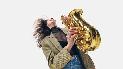 Female saxophonist throwing head back, lost in melody, fully absorbed in rhythm and powerful...