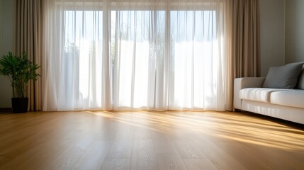 Bright, spacious living room with large windows, natural light, and hardwood floors