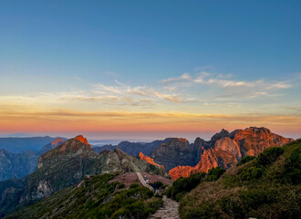 Magnificient sunrise over the hiking trail at Pico do Arieiro