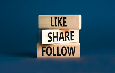 Like share follow symbol. Concept words Like Share Follow on beautiful wooden blocks. Beautiful...