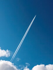 Jet Trail Across Azure Sky.