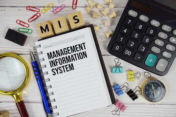 MIS - Management Information System acronym on notepad, Business concept background © may1985