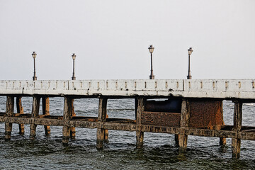 Obraz premium The Rock Beach of Pondicherry or Puducherry, also known as Promenade Beach or Gandhi beach, is an exceptional place where the shore is densely populated by majestic rocks. At Tamil Nadu, South India.