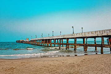 Obraz premium The Rock Beach of Pondicherry or Puducherry, also known as Promenade Beach or Gandhi beach, is an exceptional place where the shore is densely populated by majestic rocks. At Tamil Nadu, South India.