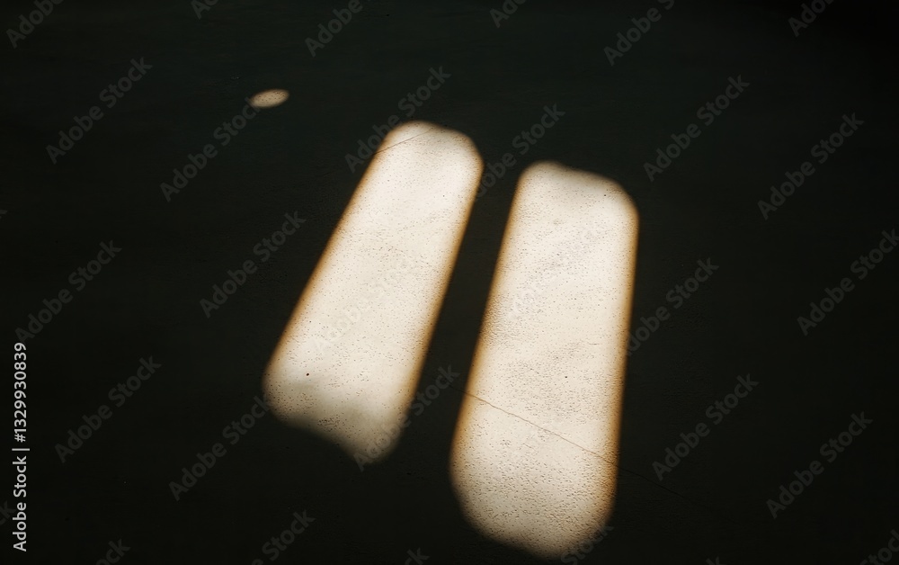 Poster Two Beams Of Sunlight Shine Through Window Casting Rectangle Of Illumination With Dust Particles Visible On Dark Floor