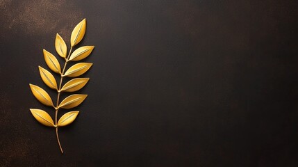  a gold leaf on a black background, creating a striking contrast between the two colors The leaf is intricately detailed, with its veins and edges clearly visible