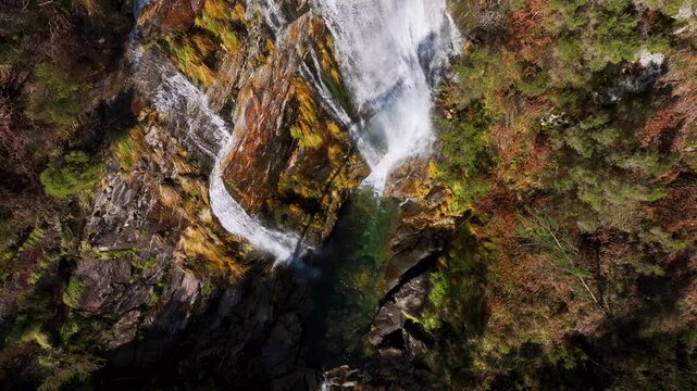 Above View Of Fervenza de Cadarnoxo (Boiro) Waterfalls In A Coruna, Spain. Aerial Slow Motion Shot