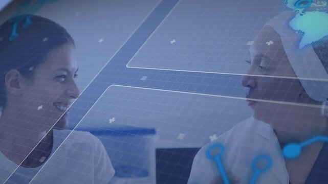 In laboratory, scientists discussing research with digital animation overlay on data