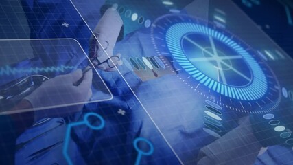 Performing surgery, surgeons using digital interface with animation and data overlay - Powered by Adobe