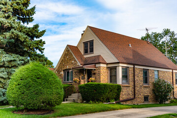 Private family home property. House exterior architecture. Private house in suburban area. Suburban house architecture. Suburb exterior with housing property. Suburban neighborhood. Dwelling home