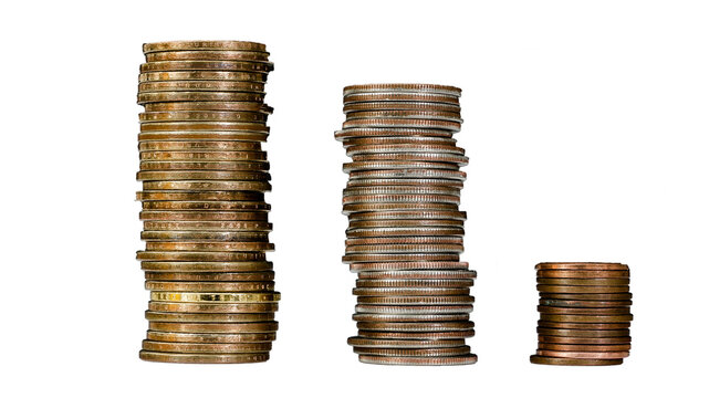 Stacks of coins arranged by size showcasing different denominations, cut out (PNG)