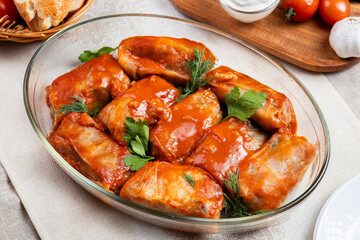 Stewed stuffed cabbage Ukrainian cuisine. Golubtsi is a dish of Ukrainian cuisine, also Stecharacteristic of Eastern European and Middle Eastern cuisine. Golubtsi with sour cream. Lean golubtsi. Dolma