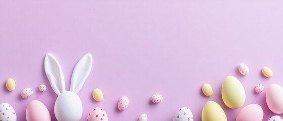 Fototapeta premium Pastel Easter eggs and bunny ears on a light purple background Concept of spring holiday, Easter celebration, and festive decoration