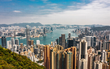 Fototapeta premium Aerial view of Hong Kong city on a sunny day