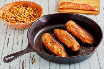 blackened fish served in a cast iron skillet